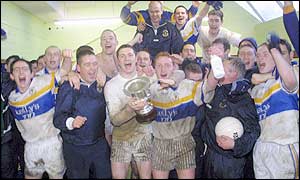 Happy Errigal Ciaran players with the Ulster Club Championship trophy
