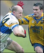 Errigal Ciaran's Peter Canavan was marked by Enniskillen's Michael Lilly