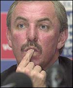 David Graveney puts his finger on his lips