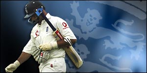 Nasser Hussain walks dejectedly off the pitch