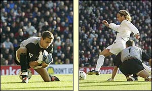 Jerzy Dudek lets the ball roll between his legs to allow Diego Forlan an easy tap-in