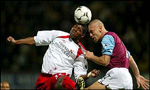 West Ham's Tomas Repka challenges Agustin Delgado
