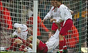 James Beattie celebrates with team-mates after scoring the winner for Southampton