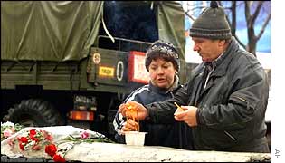 People lay tributes near the Moscow siege theatre 