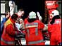 Rescue workers evacuating injured from the building (AP)