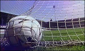 A football in the back of the net