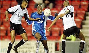 Wigan's Nathan Ellington gets behind the Fulham defence