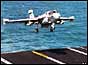 An EA-6B Prowler lands on the aircraft carrier USS Nimitz in the Persian Gulf , Jan 1998 