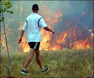 Glenorie resident checks fire near his home 