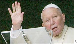 Pope John Paul II waves from window