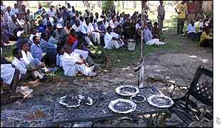Staff outside the Paradise Hotel