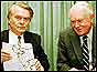 Lord Owen holding up a map of Bosnia with Cyrus Vance
