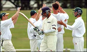 New Zealand Central Districts celebrate the wicket of Rahul Dravid for nought caught by Martyn Sigley off Michael Mason