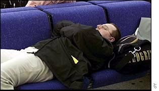 Passenger sleeping at the airport