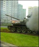 Yugoslav tank firing on apartment blocks
