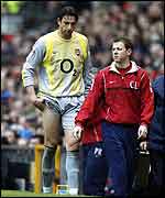 Arsenal's Rami Shabaan limps off