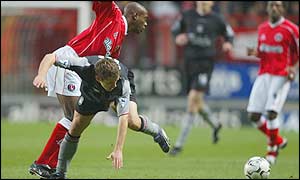 Richard Rufus and Michael Owen tangle in their match at the Valley