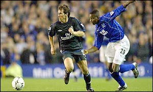 Gianfranco Zola runs with the ball away from Everton's Joseph Yobo