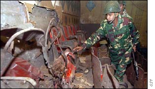 Soldiers inspect a bombed theatre in Mymensingh