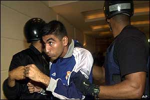 Suspected gunman is arrested by police 