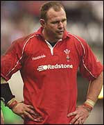 Scott Quinnell feels the pain of defeat by England