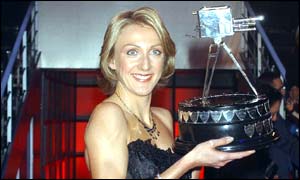 Paula Radcliffe poses with her trophy