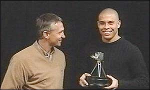 Ronaldo collects his award from Gary Lineker after being named Overseas Personality of the Year