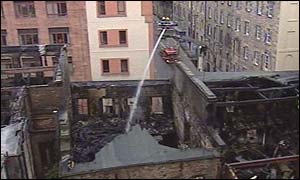 Firefighters on ladders