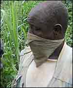 Villager with a cloth over his mouth