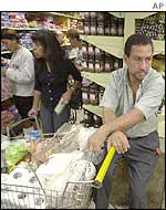 Shoppers stock up in a Venezuelan supermarket