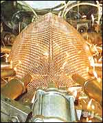 A fencing mask being welded at the Leon Paul factory