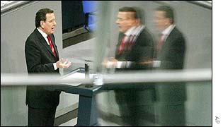 Gerhard Schroeder is reflected in mirrors