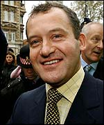 Paul Burrell celebrates his court victory