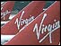 Tail fins of Virgin planes with the red and white logo