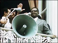 Dr Agostinho Neto greets the crowds