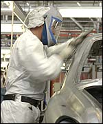 Worker makes sure the body is perfect