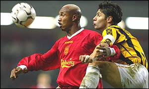El-Hadji Diouf of Liverpool is challenged by Vitesse Arnhem's Dejan Stefanovic