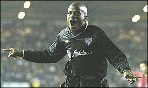 Julio Dely Valdes celebrates his second goal that puts Malaga 2-0 up 
