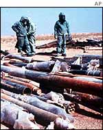 UN inspectors with destroyed Iraqi sarin rockets