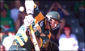 South African batsman Graeme Smith jumps in the air to avoid a ball from Pakistan bowler Shoaib Akhtar