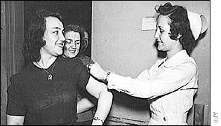 Women receiving smallpox vaccinations in 1943