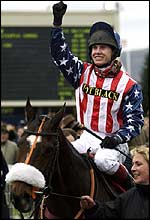 Flagship Uberalles and Richard Johnson after winning the 2002 Queen Mother Champion Chase