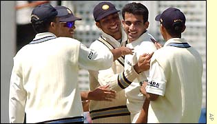 Zaheer Khan is congratulated on his maiden Test five-wicket haul