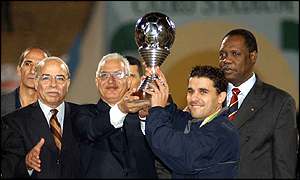 Zamalek celebrate their victory with Caf President Issa Hayatou