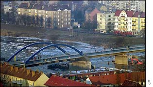 People cross the new City Bridge (Stadtbruecke) across the river Oder between the German city of Frankfurt, left, and Polish city of Slubice