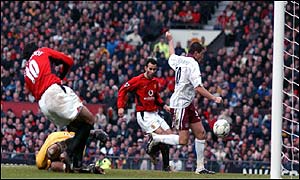 Man Utd celebrate a third goal thanks to Sebastian Schemmel putting the ball past his own keeper to help Utd to an emphatic 3-0 win