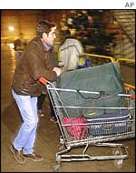 Refugee leaving Sangatte with his belongings