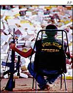 Brazilian police guard seized cocaine