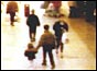 CCTV footage of James Bulger being led away by older boy