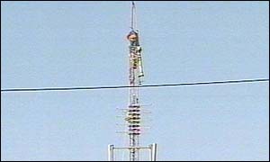 Contractors installing a Tetra mast at Bossiney 